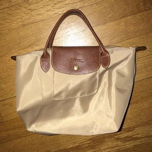 Tan mini Longchamp bag